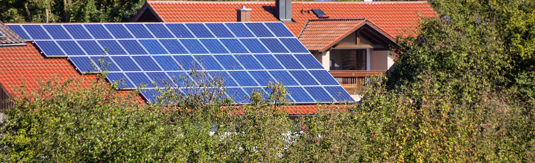 Houses with solar panels on the roof.